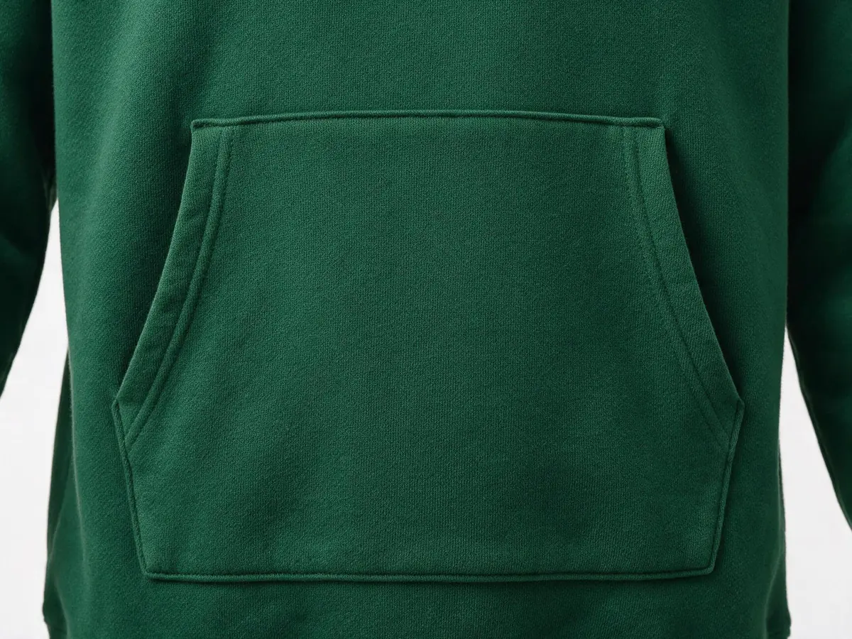 A green hoodie front with a kangaroo pocket and slanted openings on both sides.