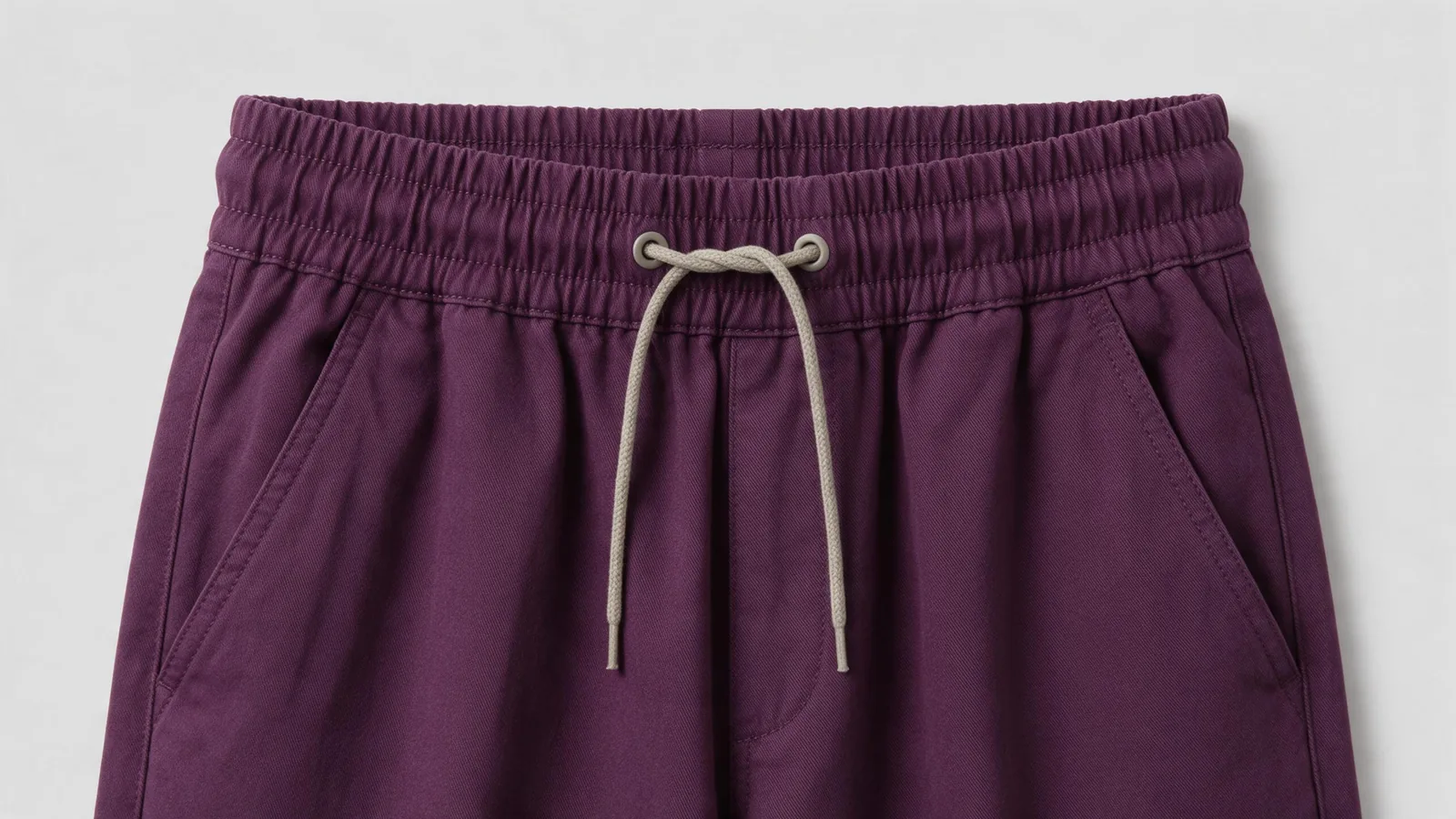 Dark plum waistband with gathering and a front drawcord.