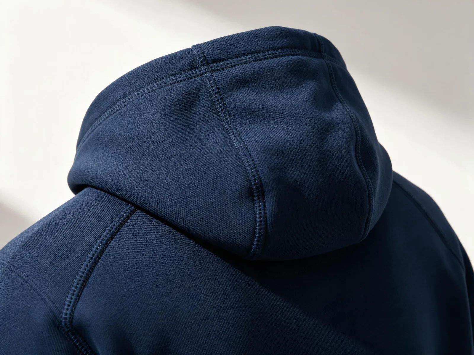 AI design concept showing a navy hoodie hood seam
