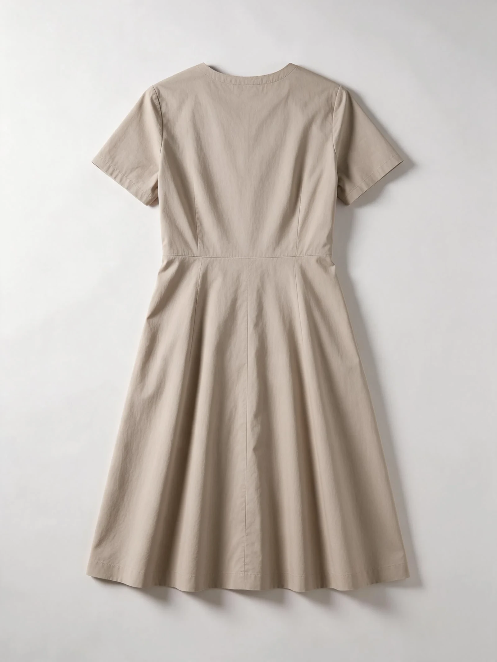 AI design concept of a beige casual dress viewed from the back