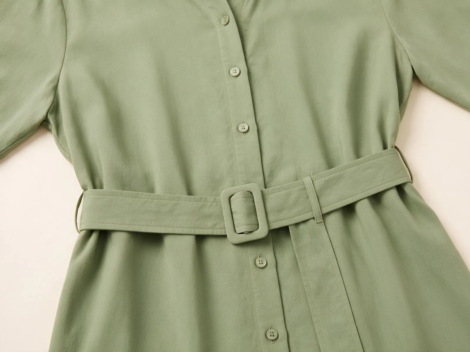 AI design concept showing a sage green shirt dress button front and matching waist belt
