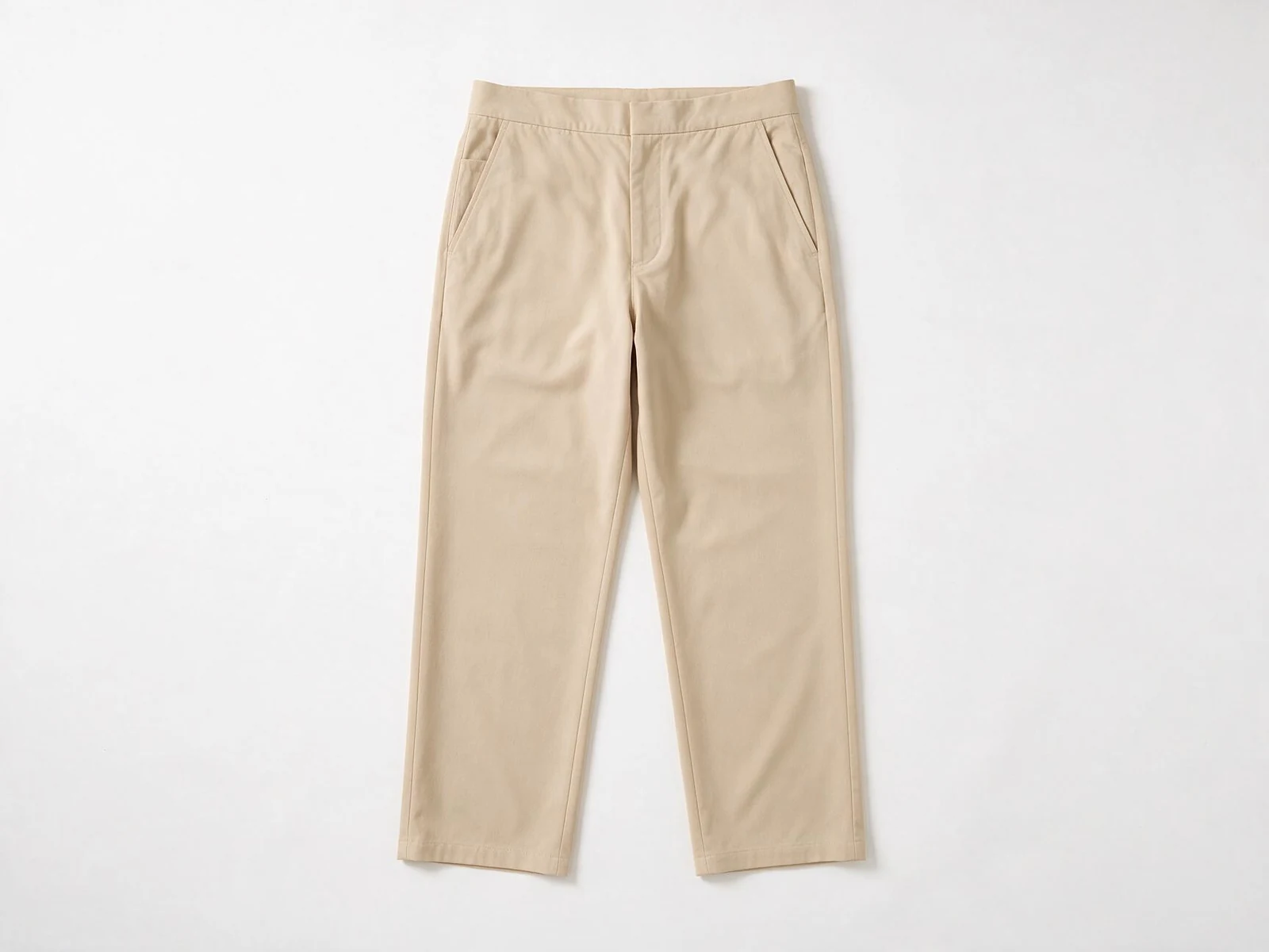 AI design concept of beige straight-leg trousers laid flat from the front.